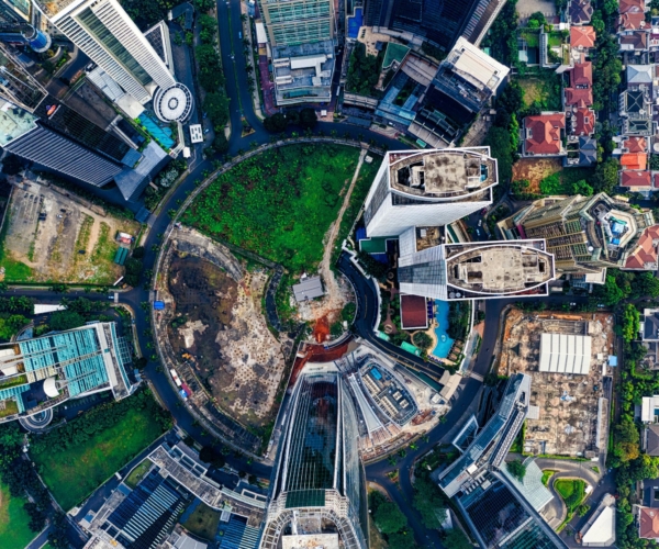 Stunning aerial view showcasing Jakarta's modern skyline and green spaces.